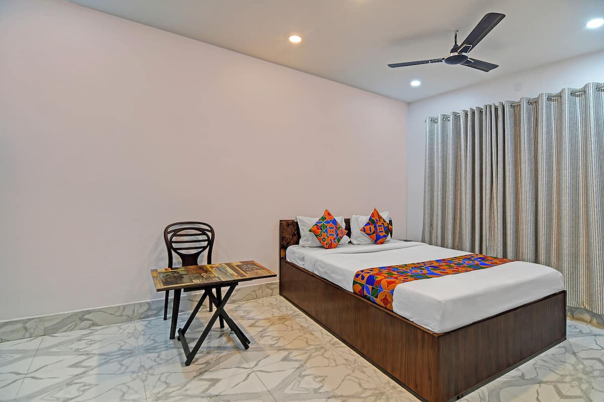 Habitación familiar | Sábanas de algodón egipcio y ropa de cama de alta calidad