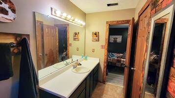 Jetted bath, hair dryer, towels, soap