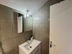 Shower, towels, soap, toilet paper