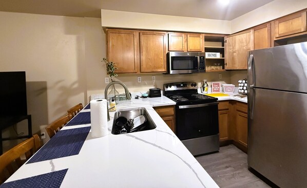 Fridge, microwave, oven, stovetop