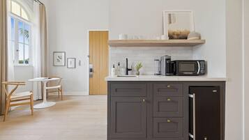 Fridge, microwave, coffee/tea maker, toaster