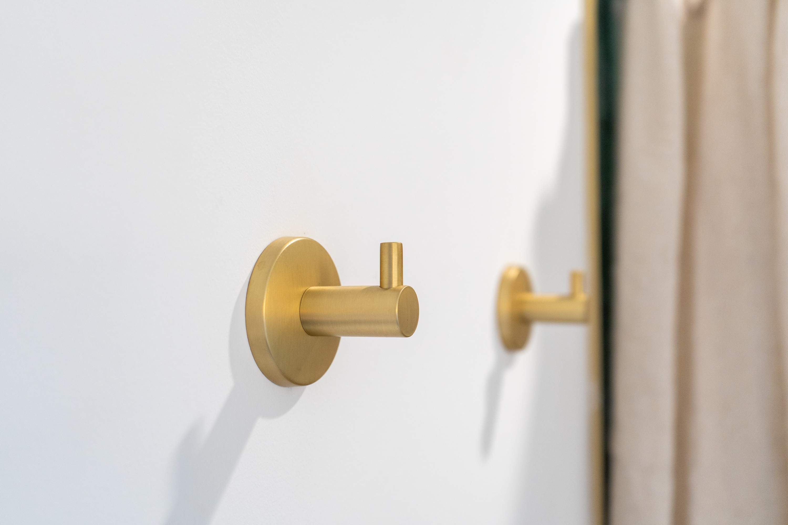 A door with a gold-colored handle and a keyhole.