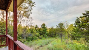 A wooden deck overlooking a forested area with a cloudy sky. - Kentucky Countryside Escape: 5 Mi to Williamstown! (Williamstown)