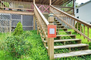 A wooden staircase leading to a covered area with a sign indicating 'The Perch Vacation Rental.' - 10 Mins to Blackwater Falls: Mtn Home w/ Hot Tub (Thomas)