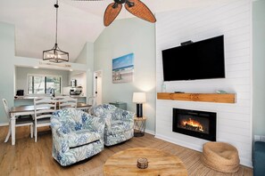 Smart TV, chimenea, reproductor de DVD y tenis de mesa