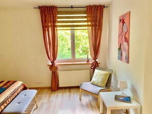 1 bedroom, desk, iron/ironing board, travel cot