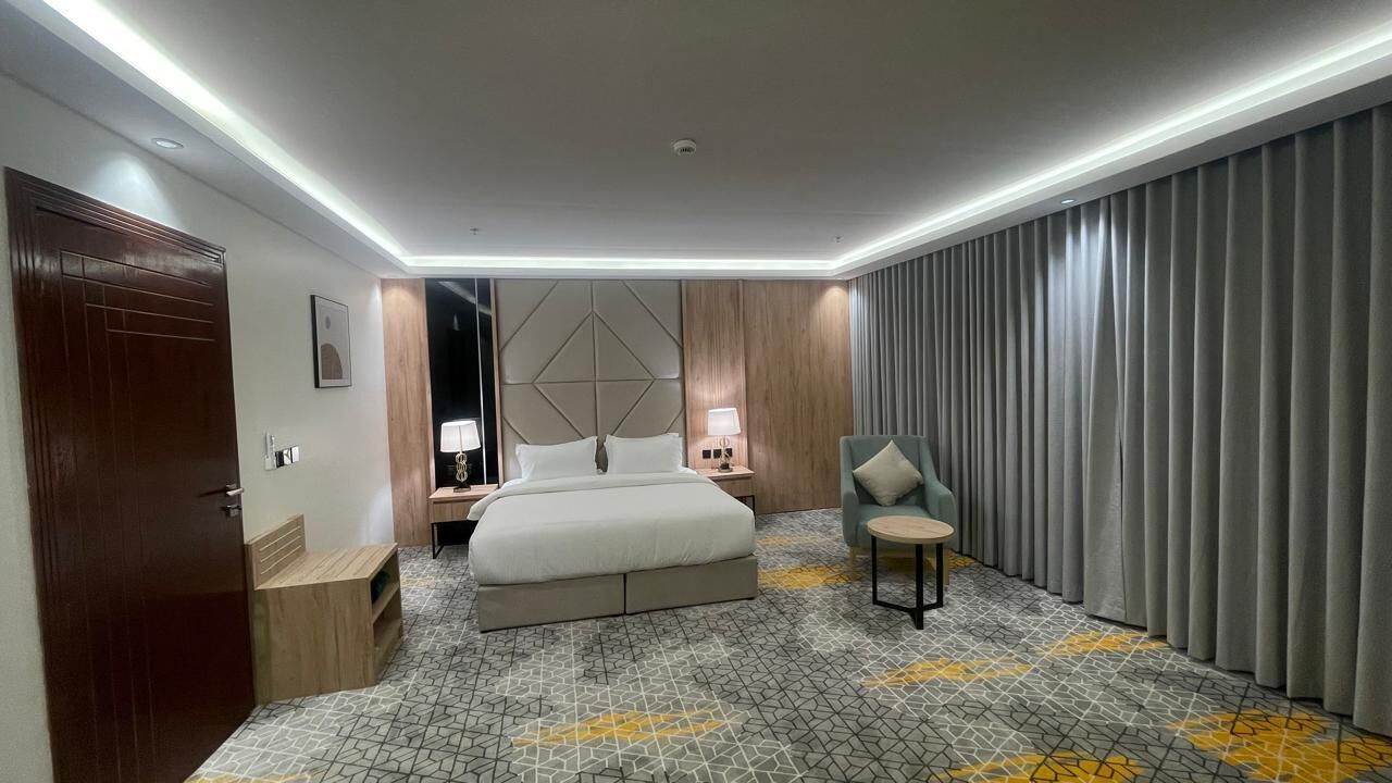 Junior Suite, City View | Premium bedding, in-room safe, laptop workspace, blackout drapes