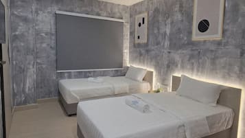 Family Room | Minibar, desk, iron/ironing board, free WiFi