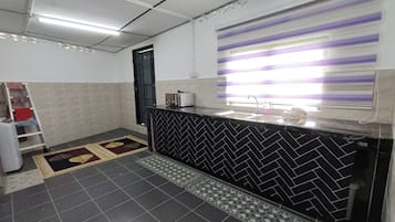 Villa | Gemeenschappelijke keuken | Een koffiezetapparaat/waterkoker