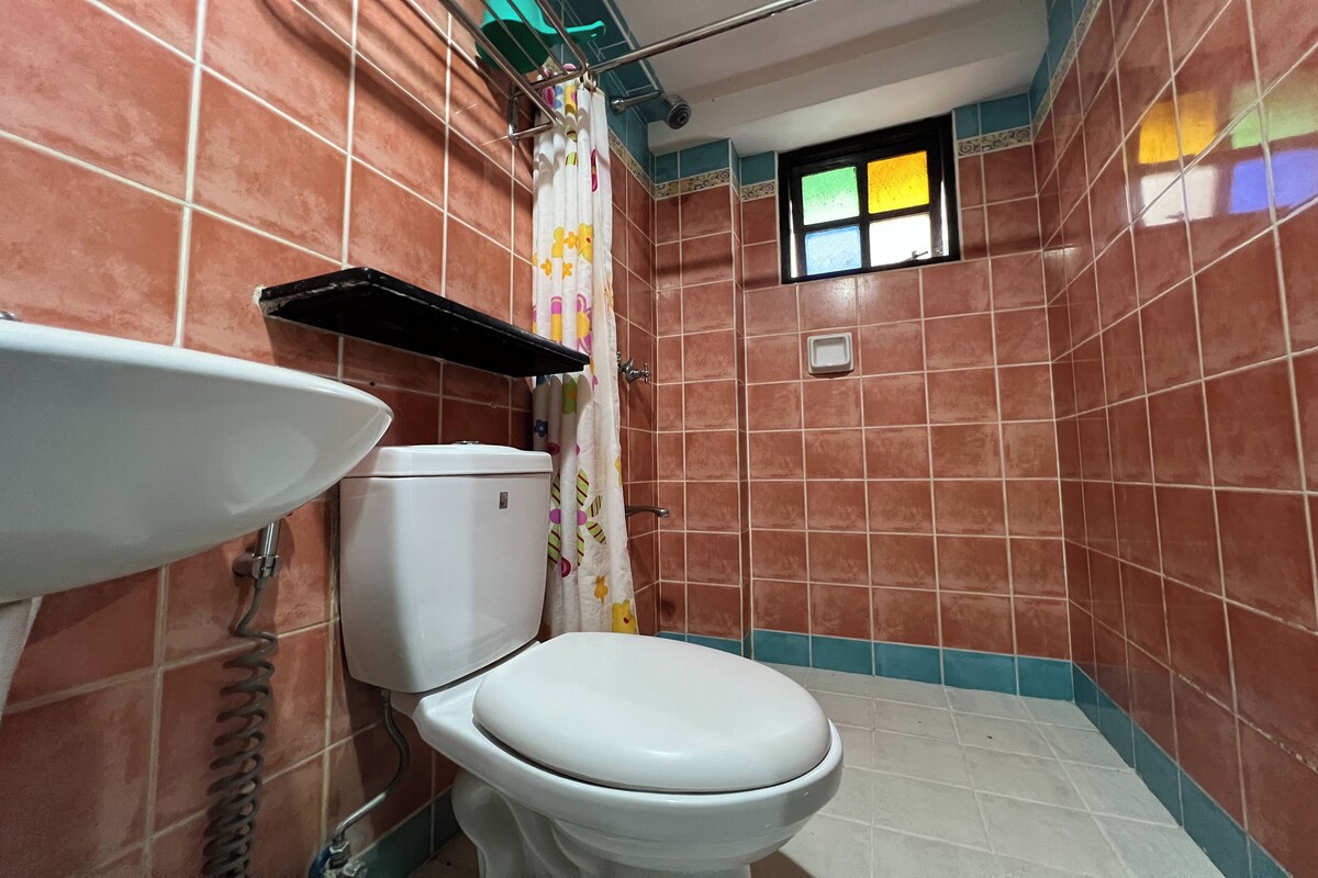 Baño | Regadera y toallas