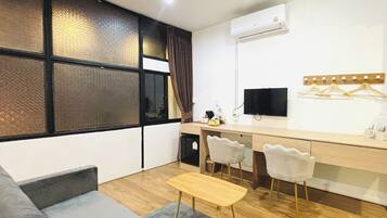 Deluxe Room, Balcony | Minibar, desk, iron/ironing board, free WiFi