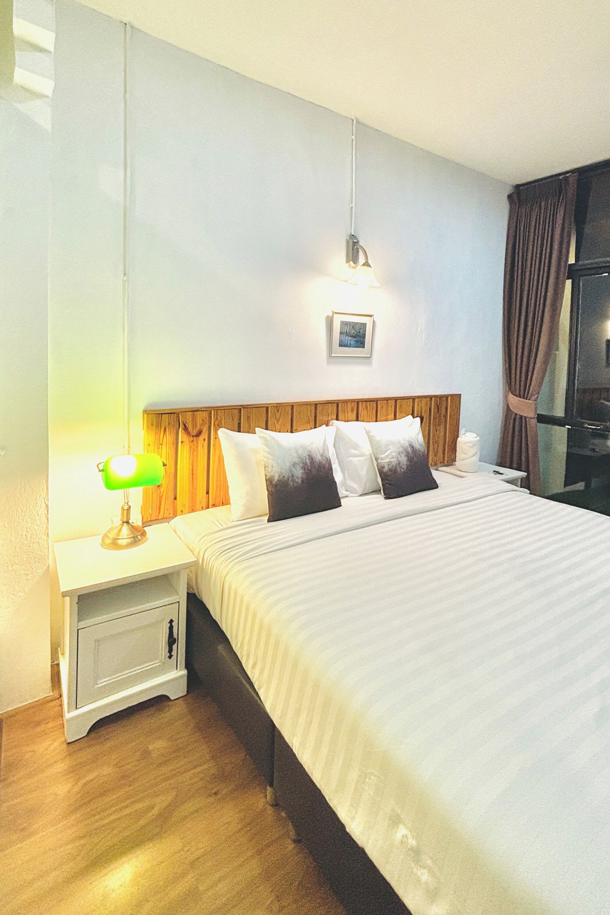 Deluxe Room, Balcony | Minibar, desk, iron/ironing board, free WiFi