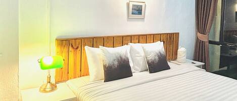 Deluxe Room, Balcony | Minibar, desk, iron/ironing board, free WiFi