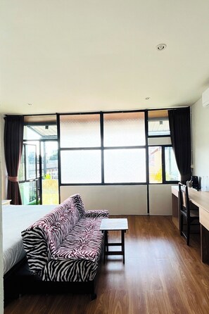 Deluxe Room, Balcony | Minibar, desk, iron/ironing board, free WiFi