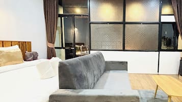 Deluxe Room, Balcony | Minibar, desk, iron/ironing board, free WiFi