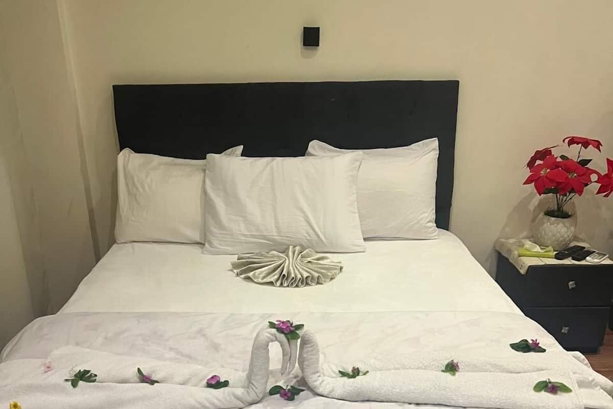 In-room safe, laptop workspace, blackout drapes, soundproofing