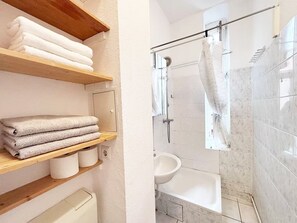 Hair dryer, towels, soap, toilet paper