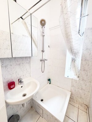 Hair dryer, towels, soap, toilet paper