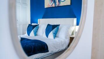 4 bedrooms, desk, iron/ironing board, travel cot