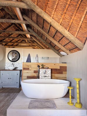 Shower, towels, soap, toilet paper