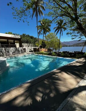 2 outdoor pools, open 8:00 AM to 10:30 PM, pool umbrellas, pool loungers