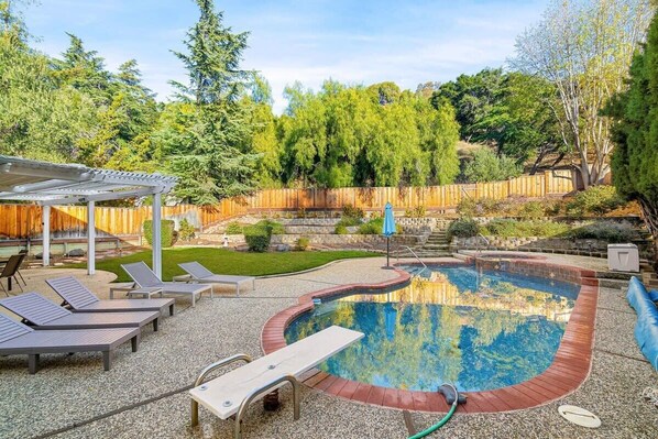 Outdoor pool, pool umbrellas, pool loungers