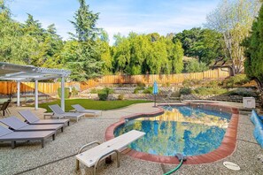 Outdoor pool, pool umbrellas, sun loungers