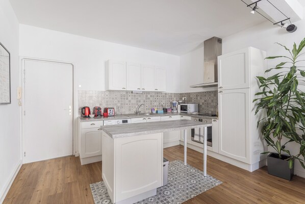 Appartement, patio, vue ville | Cuisine privée
