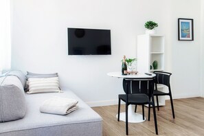 Deluxe Studio, Partial Lake View | Blackout drapes, iron/ironing board, free WiFi
