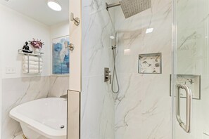 Shower, hair dryer, towels, soap