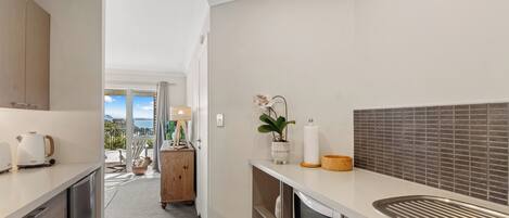 Fridge, toaster, cookware/dishes/utensils