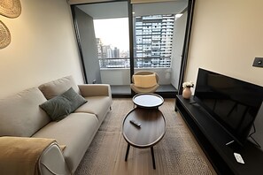 Apartment | Living area - Oceana Suites San Eugenio (Santiago)