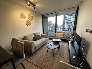 Apartment | Living area - Oceana Suites San Eugenio (Santiago)