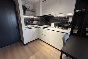 Apartment | Private kitchen - Oceana Suites San Eugenio (Santiago)