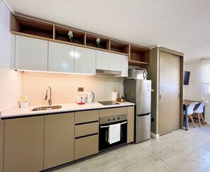 Fridge, microwave, oven, stovetop