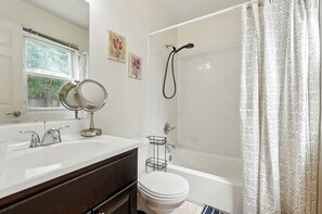 Shower, hair dryer, towels, soap