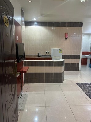 Economy Apartment, 1 Bedroom | Living area | 42-inch LED TV with satellite channels