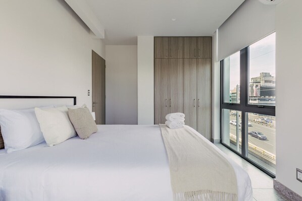 1 bedroom, desk, iron/ironing board, travel cot