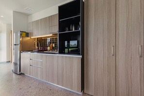 Fridge, microwave, coffee/tea maker, toaster