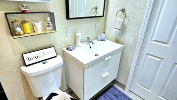 Hair dryer, towels, soap, shampoo
