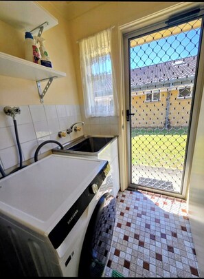 Shower, hair dryer, bidet, towels