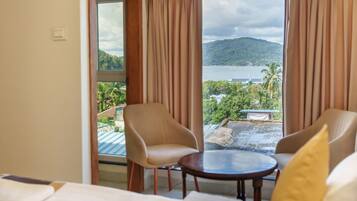 Deluxe Single Room, 1 King Bed, Air conditioning, Partial Ocean View | Desk, laptop workspace, blackout curtains, soundproofing