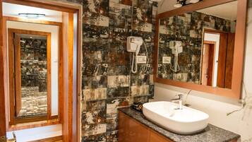 Premium Suite, 1 King Bed, Air conditioning, Sea View | Bathroom | Combined shower/bathtub, hair dryer, towels, soap