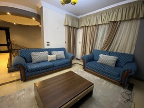 TV, fireplace - Blue Haven Luxury Villa (6th of October City)
