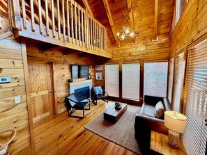 Smart TV, fireplace, foosball, books