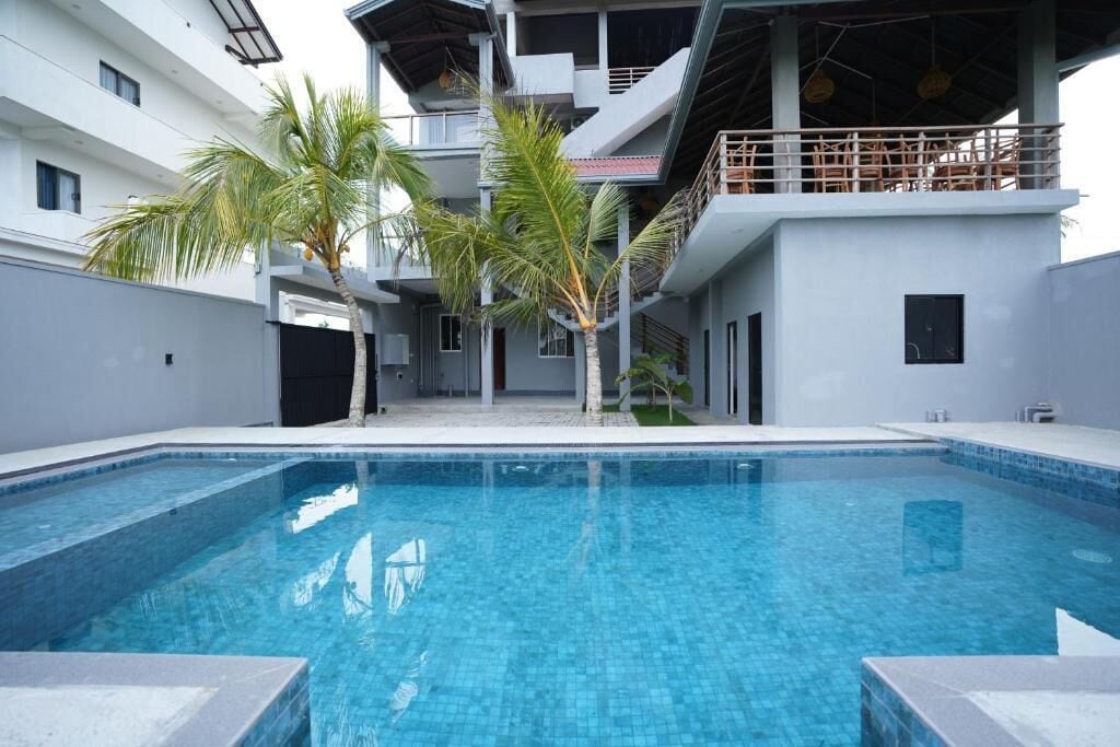 Outdoor pool, pool umbrellas, sun loungers