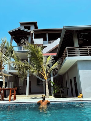 Outdoor pool, pool umbrellas, pool loungers