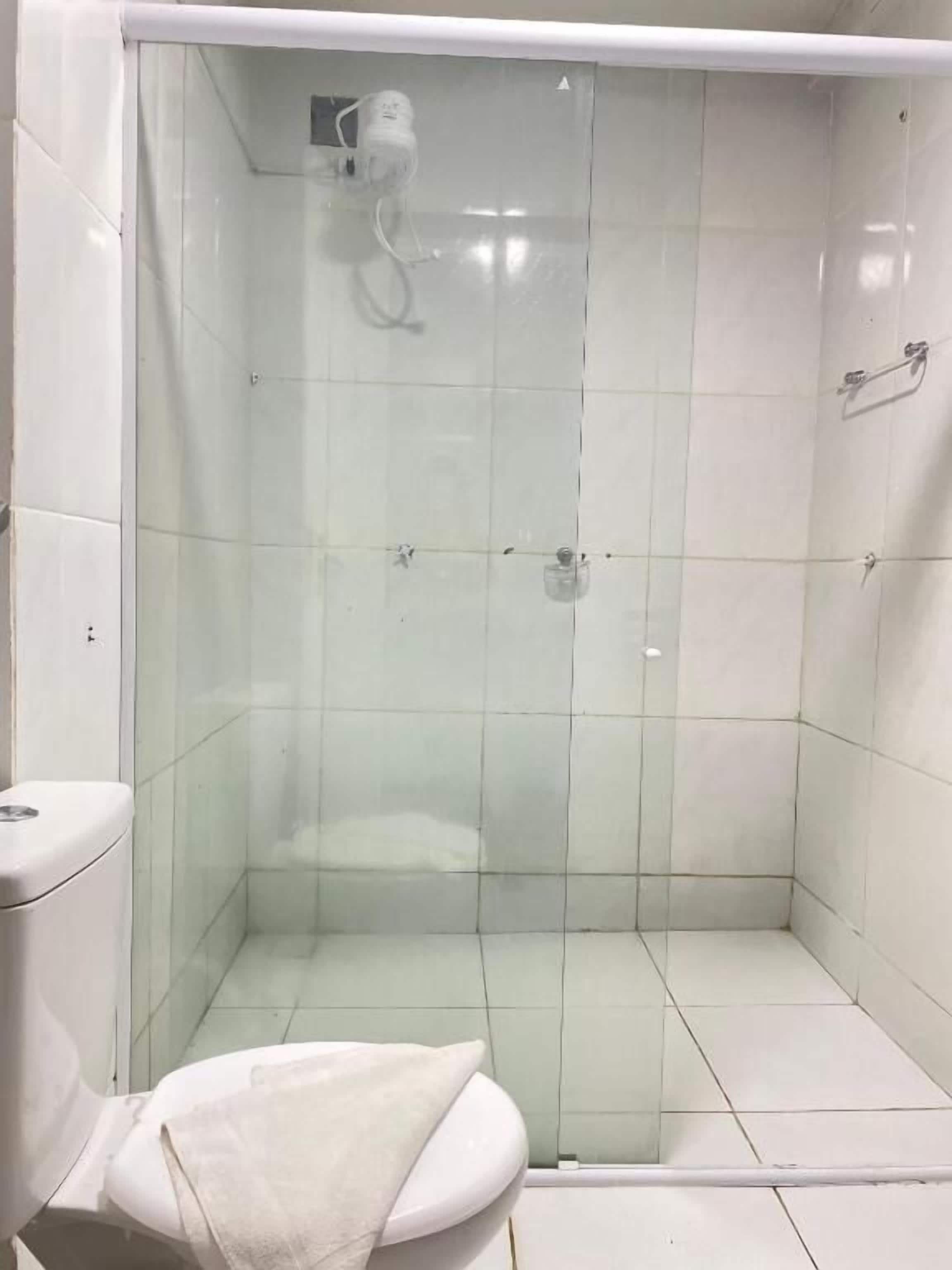 Economy Double or Twin Room | Bathroom | Shower, towels, toilet paper
