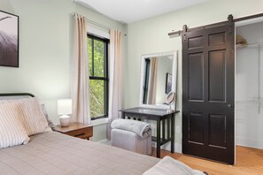 4 bedrooms, desk, iron/ironing board, travel crib
