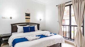 Luxury Apartment, 2 Bedrooms, Patio, Pool View | Iron/ironing board, free WiFi